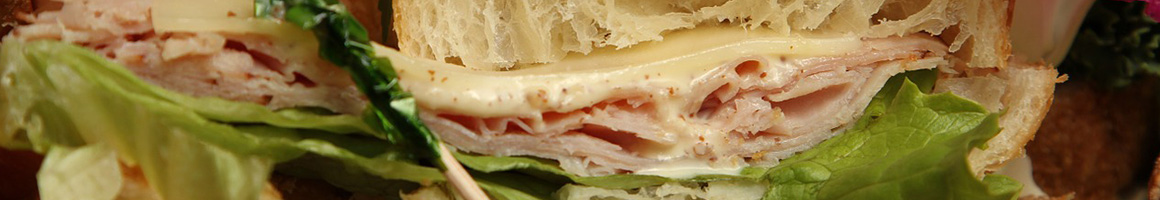 Eating Italian Pizza Sandwich at Cottage Inn Pizza Hilliard restaurant in Hilliard, OH.